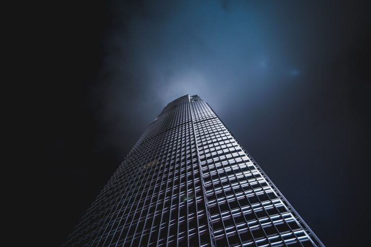 low angle photography of black building