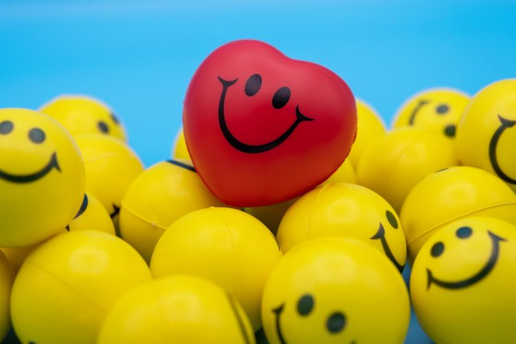 red and yellow smiley balloon