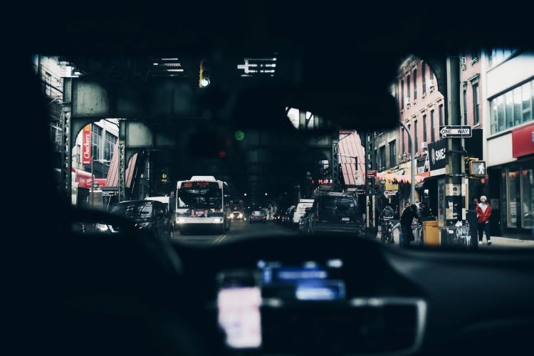 man inside car driving