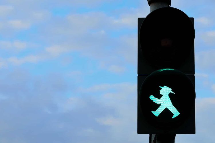 black traffic light with green light