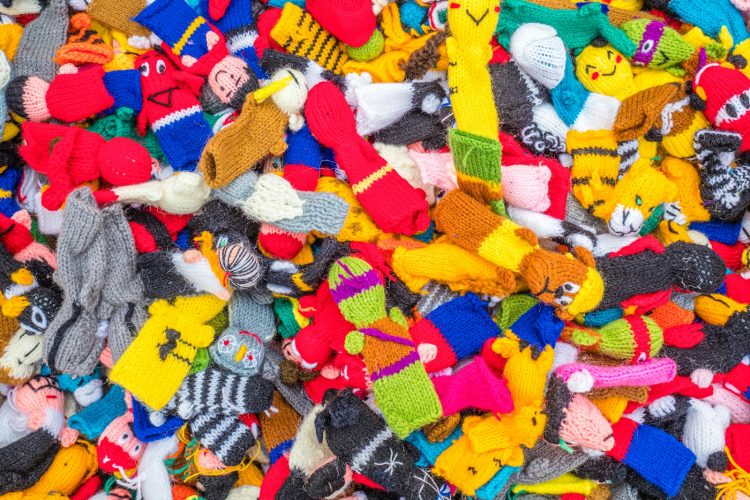 a pile of colorful stuffed animals